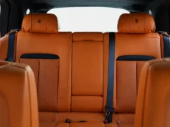 rolls royce cullinan 2025 black aa78072 orange leather rear cabin 2000x970