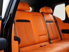 rolls royce cullinan 2025 black aa78072 orange leather rear seats 2000x970